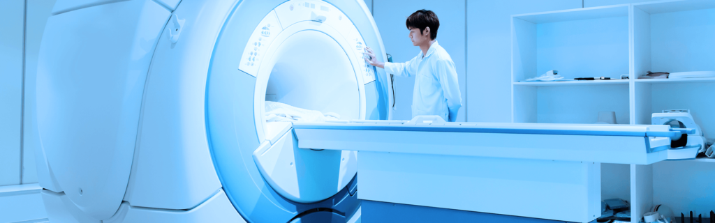 MRI technician with MRI machine