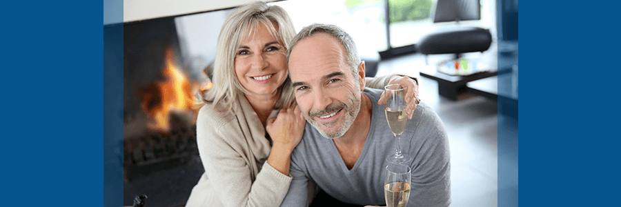 couple toasting to new year's resolution to end back pain